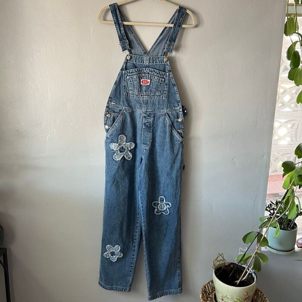 Revolt  1990s or Y2K brand denim overalls featuring distinctive flower patch app